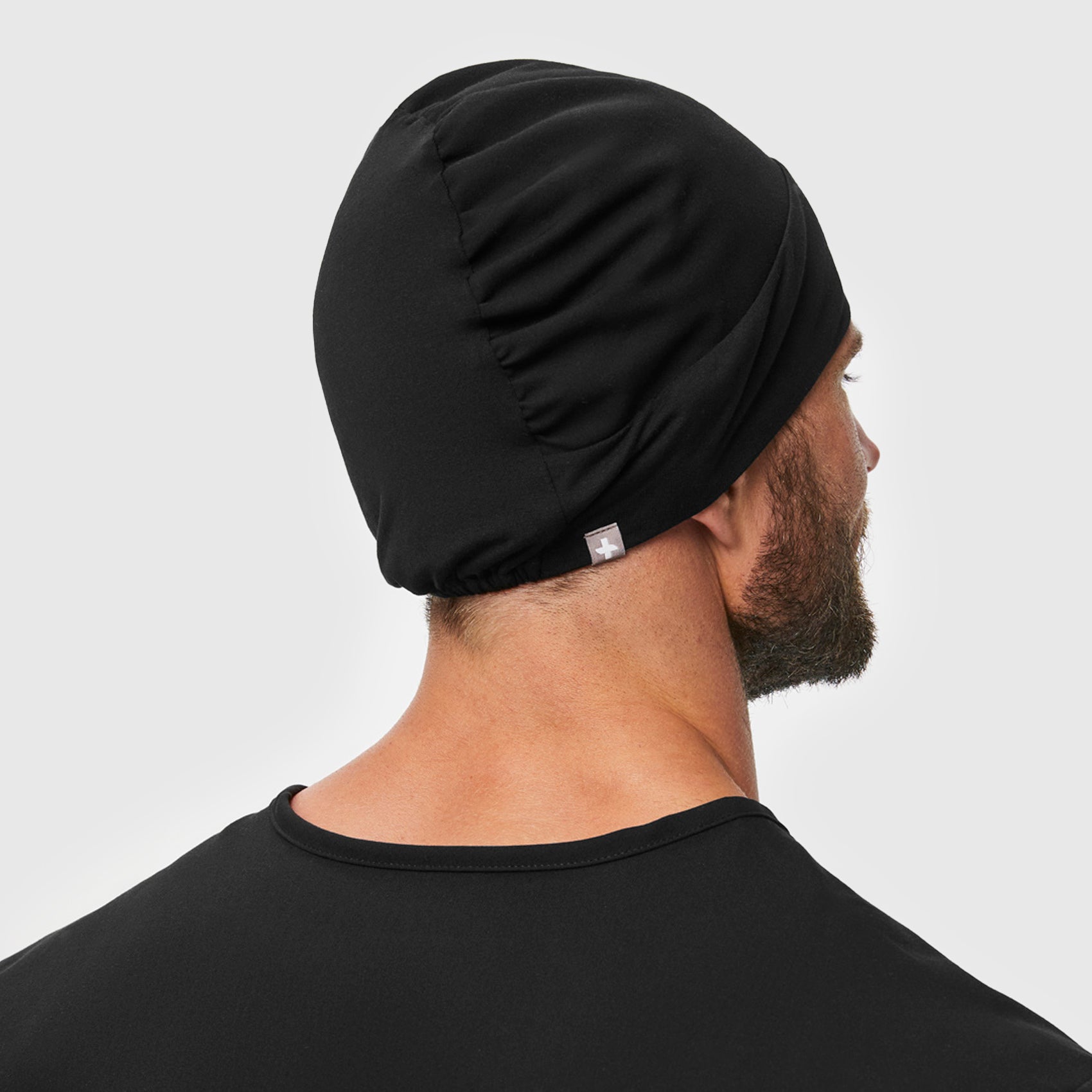 https://cdn.shopify.com/s/files/1/0139/8942/files/Q3_2023_07_BLACK_EXPANDABLE-SCRUB-CAP_CORE-REFRESH_U_DAVEY_13042.jpg?v=1695925344